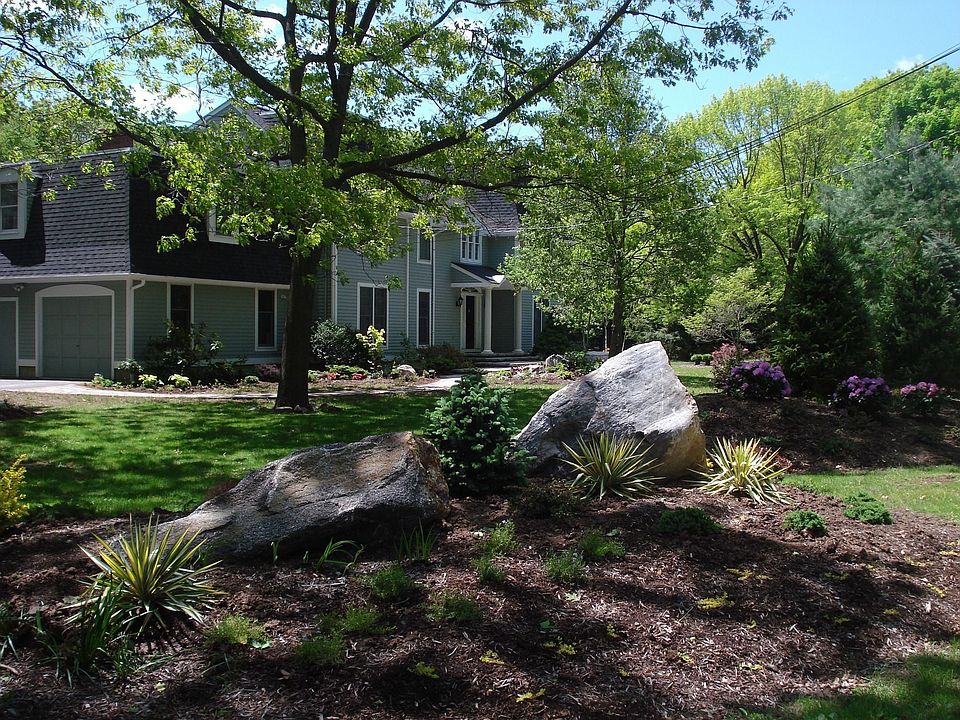 Home seen through landscaped garden. May 2008