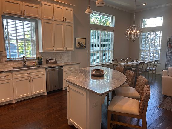 Another view of the kitchen/ dining area