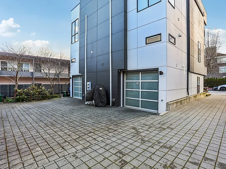Single car garage with unit, accessed off shared drive.