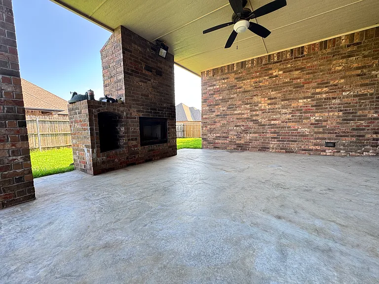 Back Patio with fireplace for both gas/wood