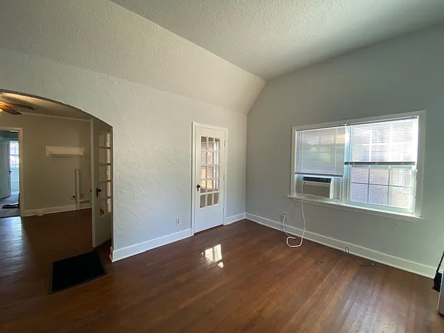 Living room with door opening into the bonus room