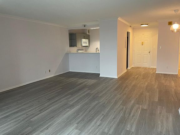 View of the open area and kitchen from the balcony