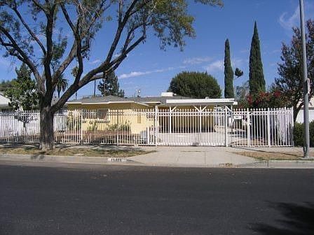 Completly gated frontage of residence