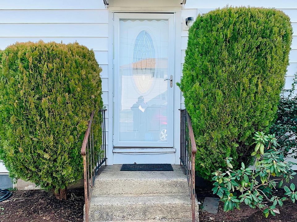 A beautiful c_rner lot Home on well manicured wrap around lot. Your entrance is on Amsterdam avenue.