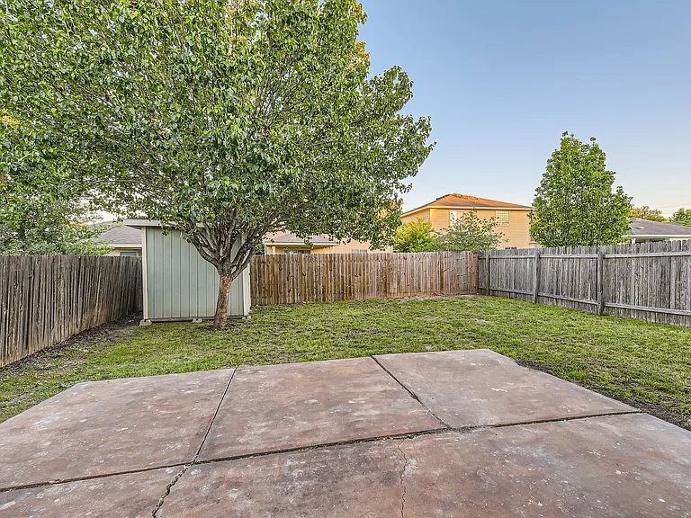Backyard Patio with Storage Shed