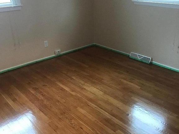 note: painters tape on the trim still as the unit is being finished. Fresh paint and varnished floors.