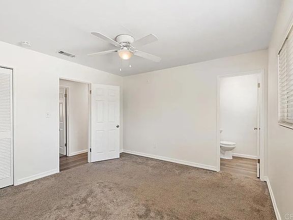 The carpet has been replaced with vinyl flooring