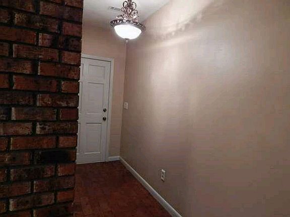 front door/foyer brick floor