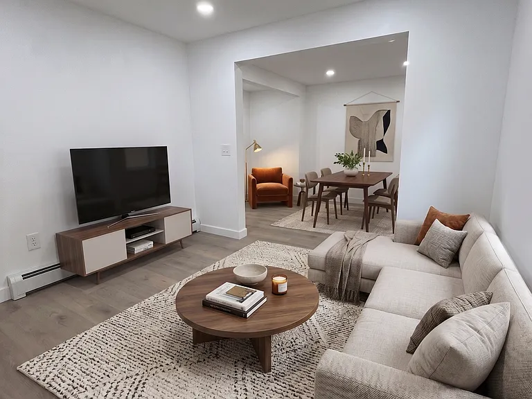 Living- This room has been virtually staged using AI to help visualize its layout and design potential.