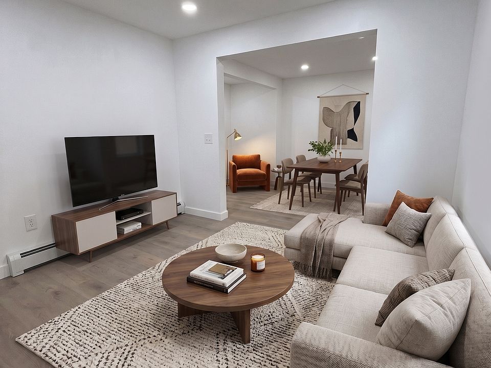 Living- This room has been virtually staged using AI to help visualize its layout and design potential.