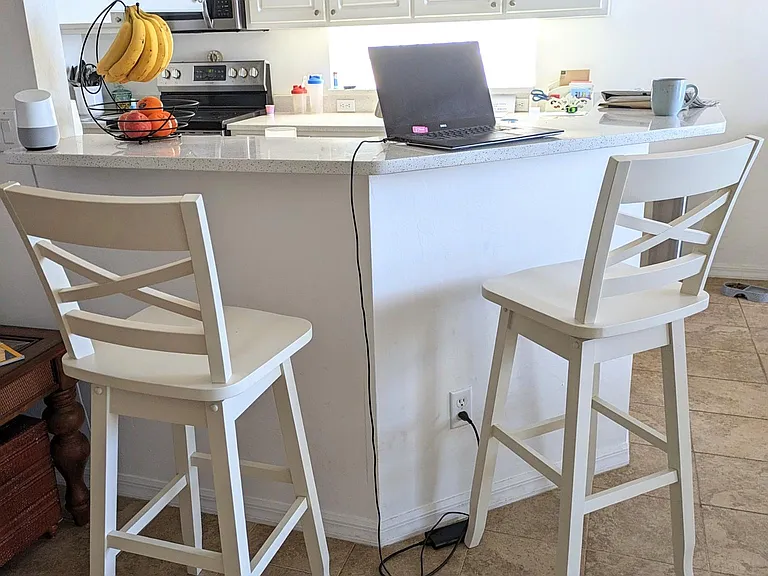 Living room & kitchen are connected with bar - used often as a stand up computer work station