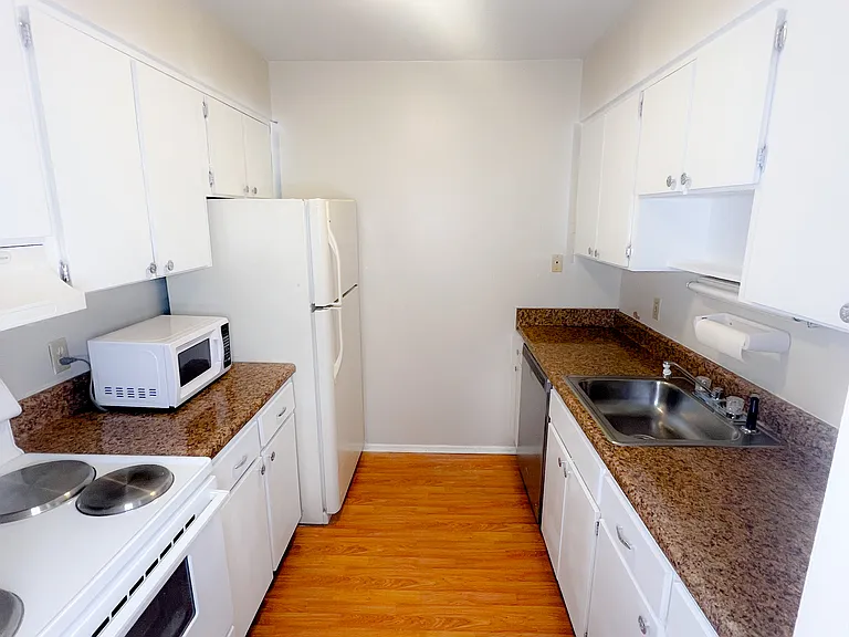 Unit is unfurnished and photos are staged. Furniture not included.