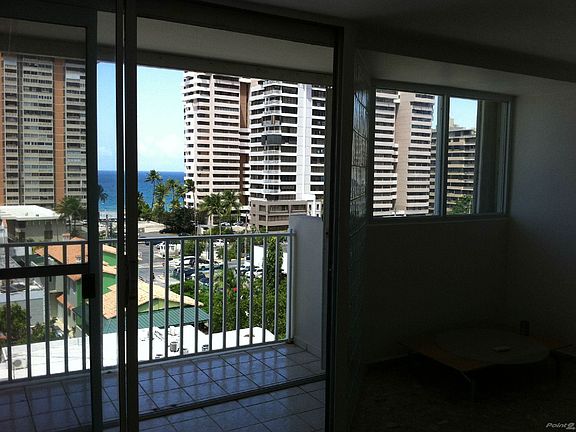 Spacious Living Room with North-facing balcony and lots of natural sunlight and cool breeze.