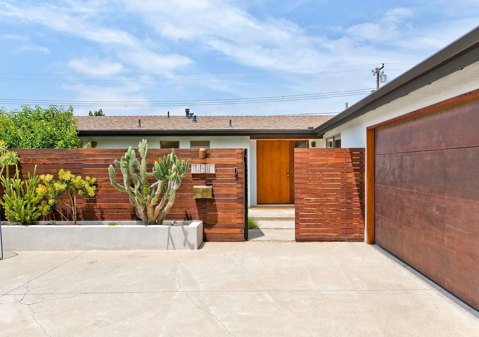 A Fully Furnished Modern Portfolio Home with a Large Backyard Oasis & 3 Comfortable Bedrooms! — Photo 1