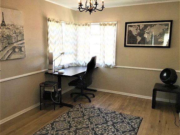 This is the dining room / work-study space, which is immediatey to your left as you enter the apartment. Very spacious.