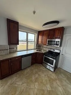 8802 Rockaway Beach Blvd — Photo 1