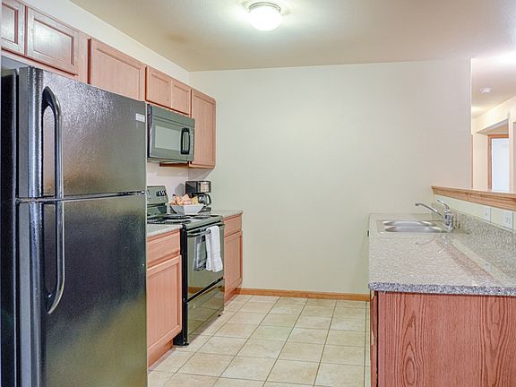 Rockridge Kitchen with Full Appliance Package, Including Refrigerator, Microwave, Range, Dishwasher and Double Sinks