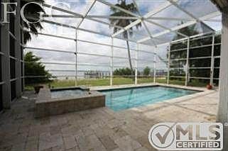 Recently installed pool with large spa.