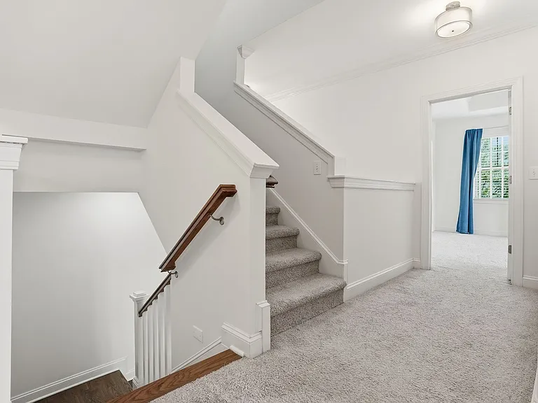 Stairs to guest or media room
