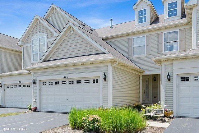 Great curb appeal, private entrance, 2 car garage, and your own private driveway!