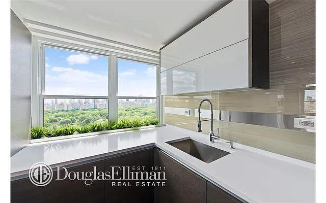 Sold by Douglas Elliman | media 13