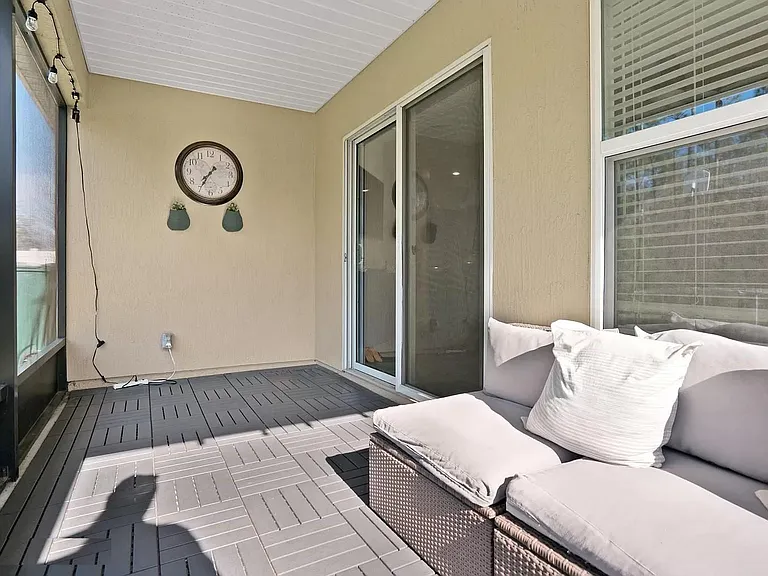 Screened Lanai with smooth surface Interlocking tiles.