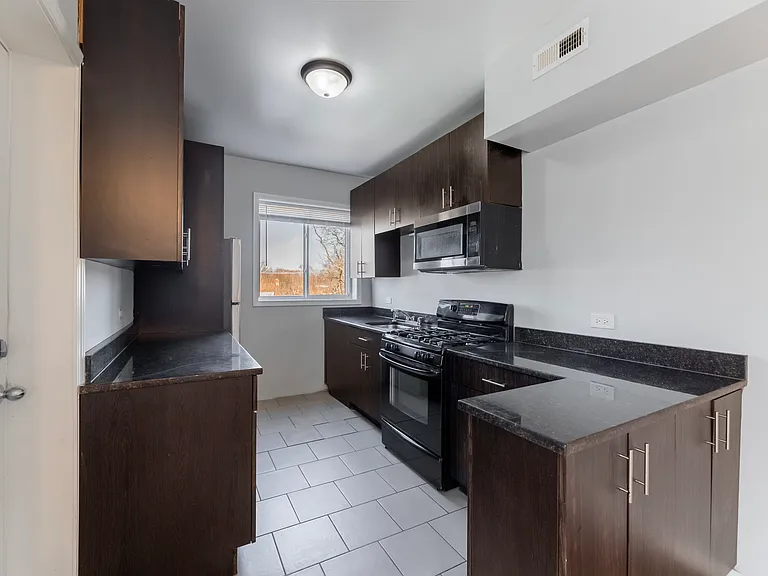 7626 S Drexel Ave — Photo 1