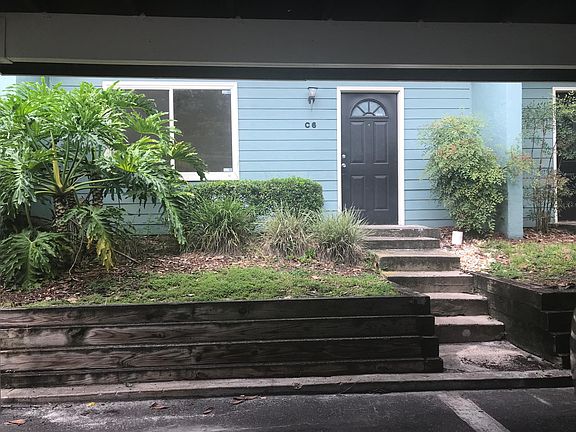 Entrance with two COVERED cart ports.