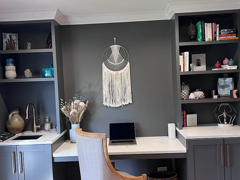 Built in shelves and desk on main floor.