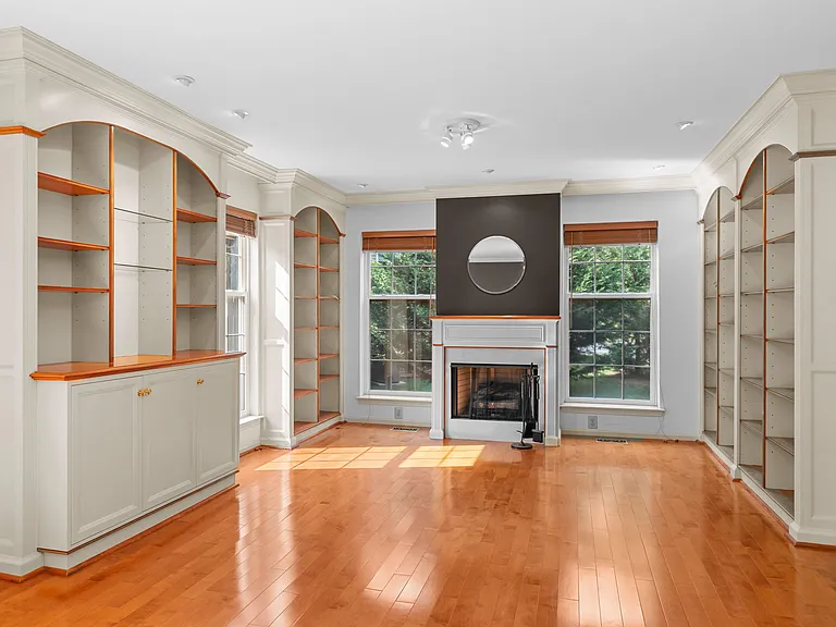built-ins galore for your knickknacks or books plus storage cabinets