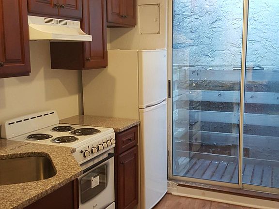 Newly renovated kitchen with granite countertops and new app