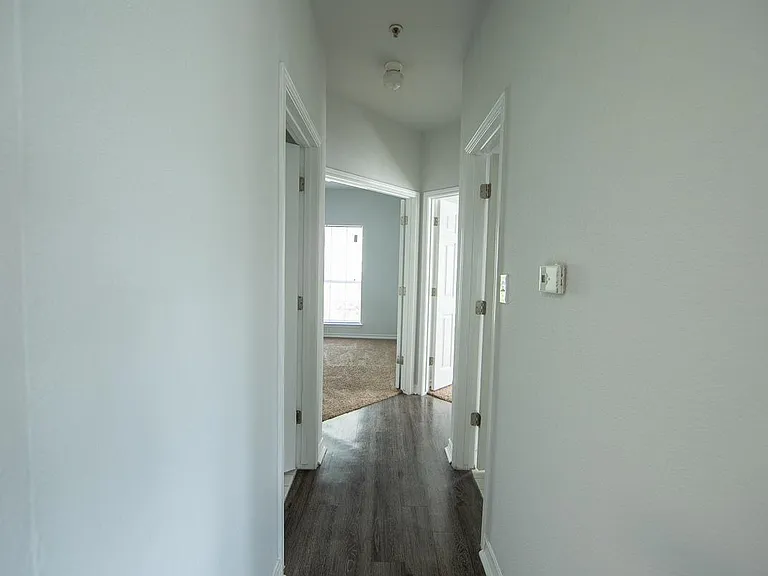 Long Hallway in 2x1.5 to Bedrooms & Bathrooms