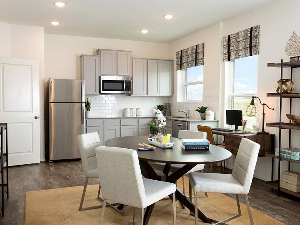 Photo of the kitchen and dining from the model