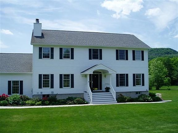 Curved-roof porch and transom entry