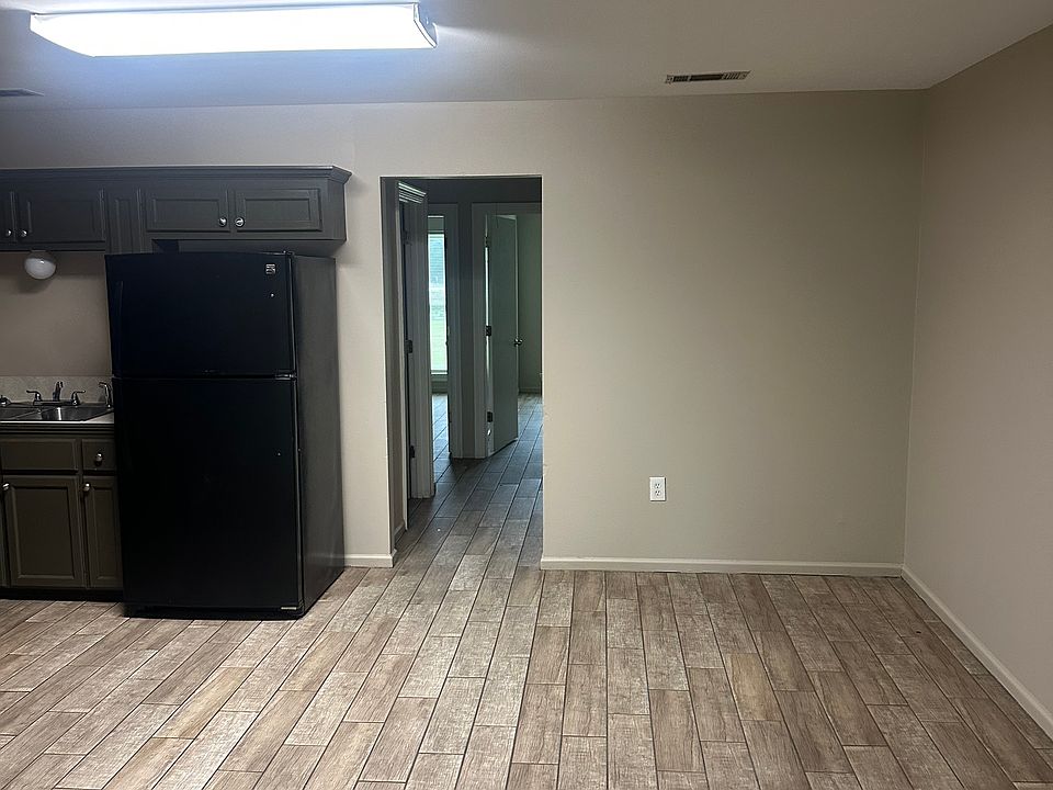 Den entrance to Kitchen and Bedrooms