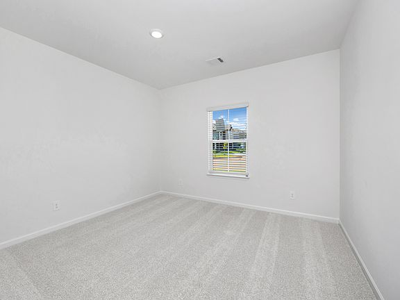 The Chandler floorplan with the Charm White interior package.