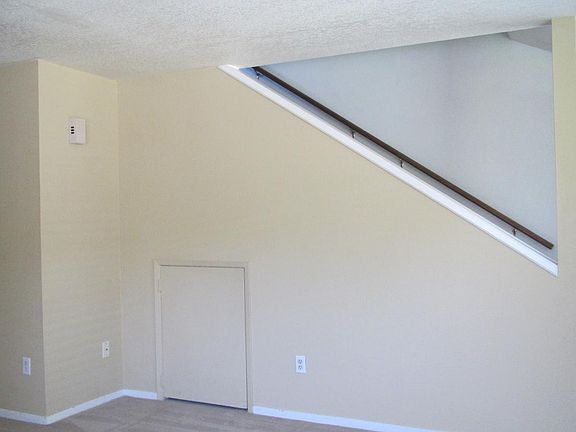 Extra storage under stairwell