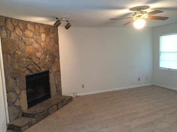 Living Room w/Stone Fireplace
