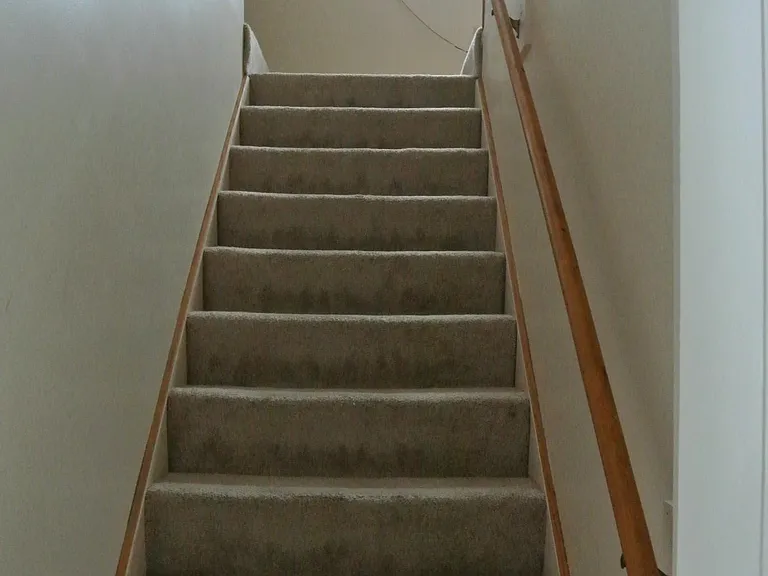 Going upstairs from the hallway.