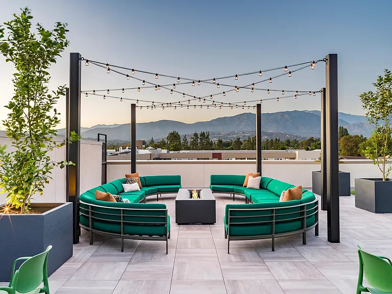 Embrace evenings under the stars at Modera Pomona! Our rooftop deck, adorned with string lights and featuring a welcoming firepit, creates the perfect ambiance for relaxation and socializing. Enjoy a magical setting where comfort meets charm and make ever