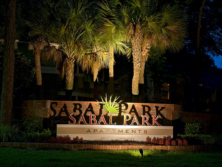 Sabal Park community entrance sign at dusk