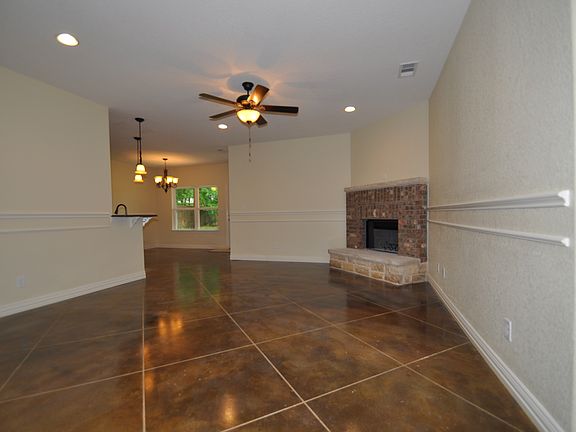Living room with scored and polished concrete