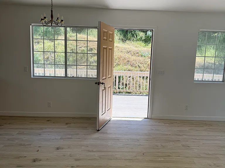 front door overlooking private deck