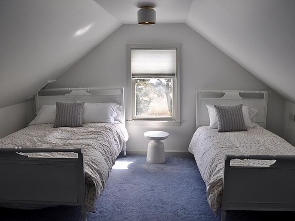 upstairs bedroom with double and twin