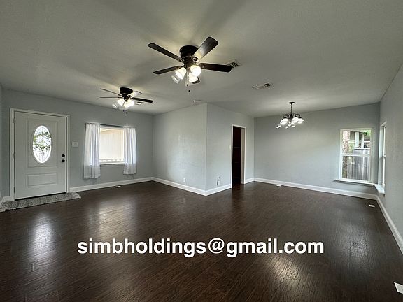 Large open concept living and dining room with lots of natural light