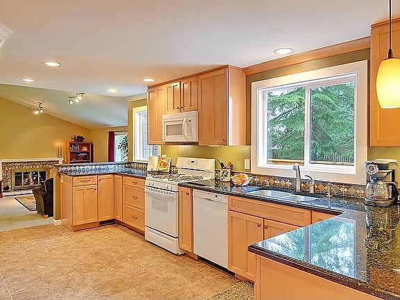 Newly designed kitchen. Maple, slab, and more!