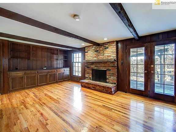 Hearth room with built ins for media and storage.