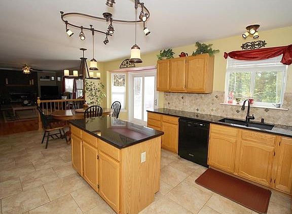Updated kitchen w/ granite counters.