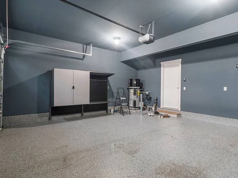 Fully finished, painted 2-car garage with epoxy floor