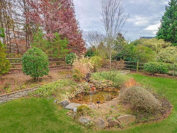 Waterfall and Pond - New Pond Lighting. Stone Walls.